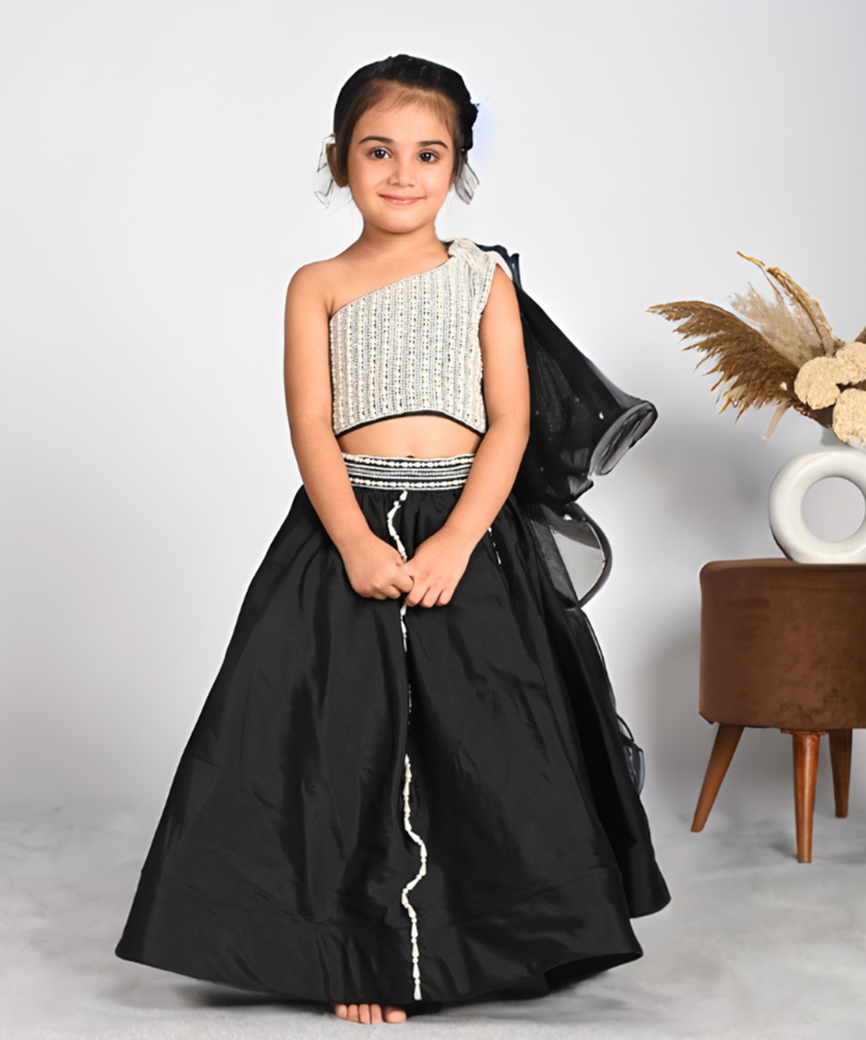Sparkling Silver Top With A Black, Voluminous Skirt Featuring White Accents